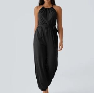 HALARA Black Sleeveless Halter Tie Back Belted Pocket Cut Out